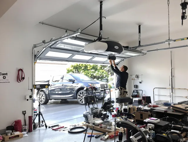 Georgetown Garage Door Repair specialist installing smart garage door opener system in Georgetown home