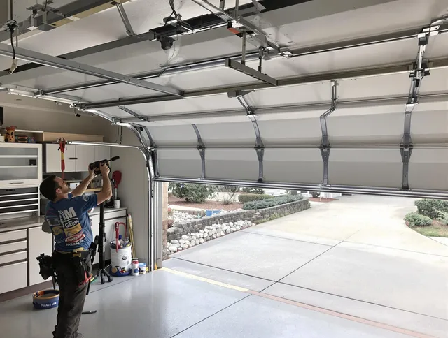 Garage door track repair service by Georgetown Garage Door Repair in Georgetown